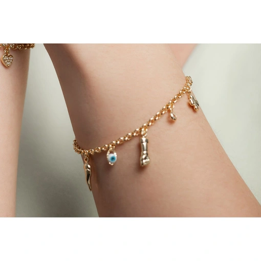 PULSEIRA COM FIGA, PIMENTA, TREVO, OLHO GREGO E PONTO DE LUZ