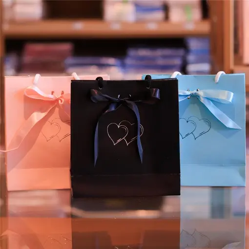 SACOLA PARA JOIAS 16X17CM COM LOGO AMOR COM 10 UNIDADES