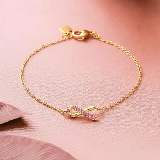 PULSEIRA COM PINGENTE DE LAÇO VAZADO E ZIRCÔNIAS