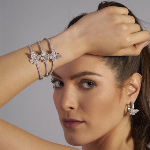 BRACELETE COM BORBOLETA CRAVEJADA DE ZIRCÔNIA BANHADO A RÓDIO