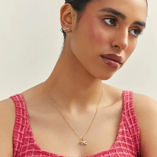 CONJUNTO DE BRINCO E COLAR DE LAÇO VAZADO COM ZIRCÔNIAS