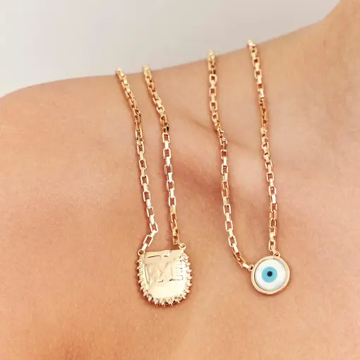 ESCAPULÁRIO COM PINGENTE DE OLHO E ESCRITA "AXÉ" BANHADO A OURO