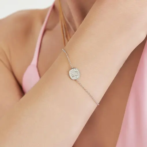 PULSEIRA COM PINGENTE OVAL E LISO DE ANJO