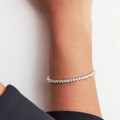 PULSEIRA RIVIERA COM CRISTAIS REDONDOS