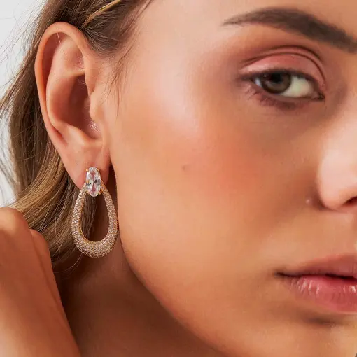 BRINCO OVAL VAZADO CRAVEJADO BANHADO A OURO