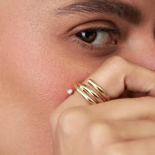 ANEL CURVO VAZADO COM ZIRCÔNIA