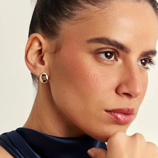 BRINCO OVAL COM CRISTAL RETANGULAR